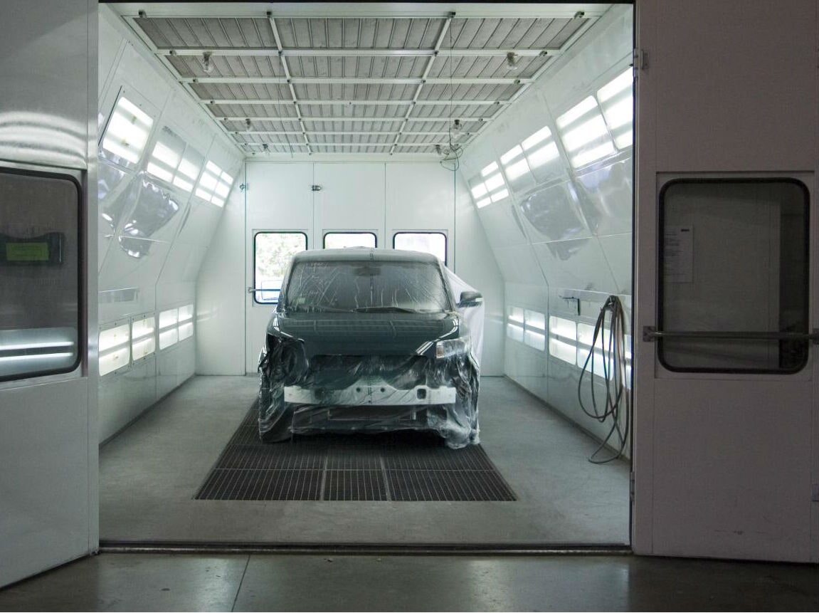 Vehicle inside the spray painting booth